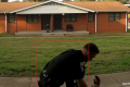 North Carolina officer fired over video of violent arrest turns himself in to face assault charge
