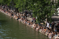 Paris halts alcohol sales to help hospitals amid deadly heat wave, as scientists blame human-caused climate change