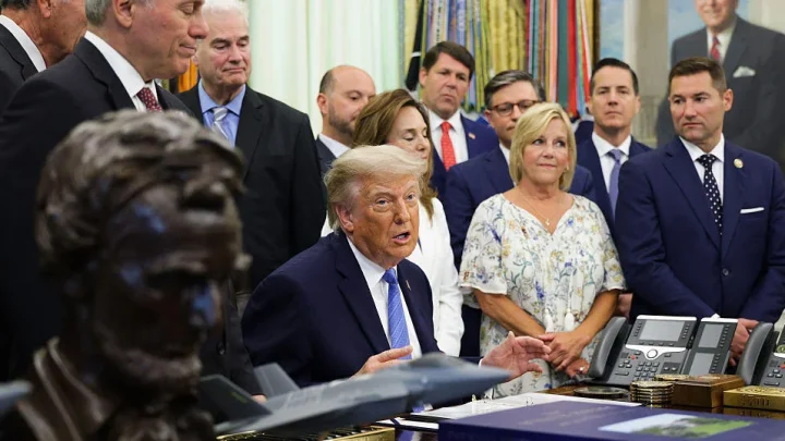 Trump signs $70 billion immigration bill, capping lengthy fight over ICE funding