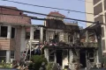 1 dead, nearly 2 dozen hurt after Queens fire spreads to 3 buildings, officials say