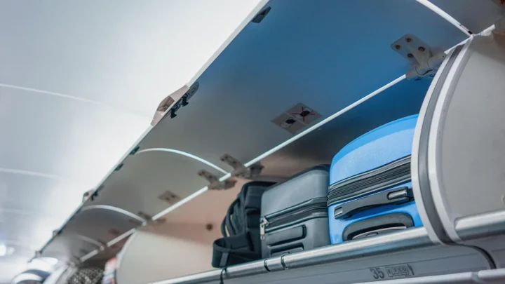 Why do airlines make passengers check their carry-on at the gate?