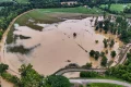 Floodwaters submerge Midwest neighborhoods still bracing for more severe storms