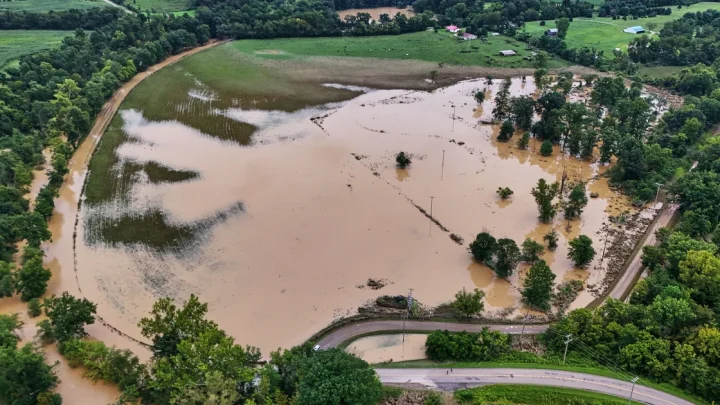 Floodwaters submerge Midwest neighborhoods still bracing for more severe storms